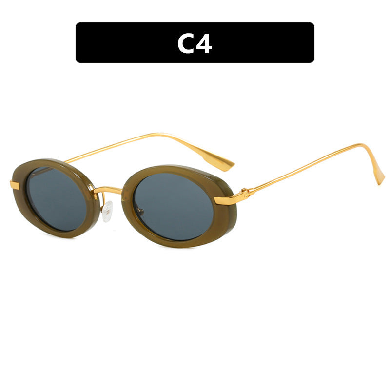 Dame moteriktig solbrille i elegant ovalt design Skanto