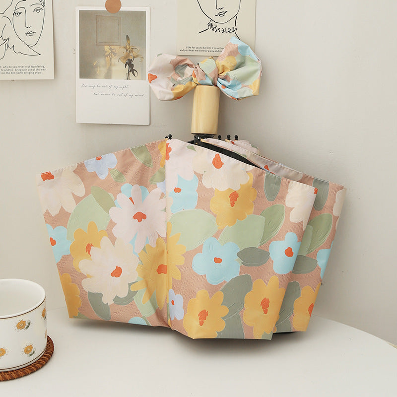 Dame sammenleggbar paraply med kreativt blomsterdesign og automatisk åpningsmekanisme Skanto