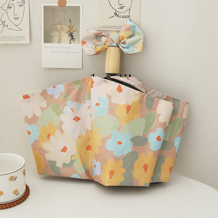 Dame sammenleggbar paraply med kreativt blomsterdesign og automatisk åpningsmekanisme Skanto
