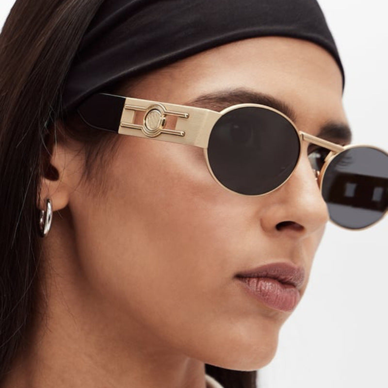 Women's round sunglasses with modern metal frame and UV protection Skanto