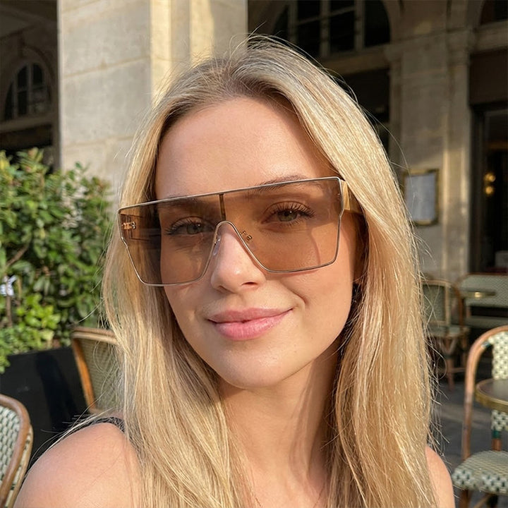 Dame Modevisir solbrille med innovativ ramme Skanto