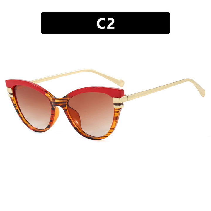 Damer Cat-Eye solbrille med elegante metallakenter Skanto