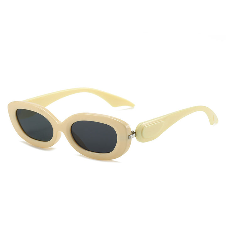 Dame moteriktig solbrille med stilfull, buet ramme Skanto