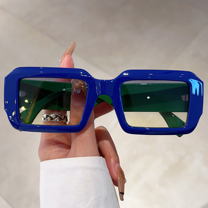 Dame oversized kvadratisk solbrille med moderne plastikkramme Skanto