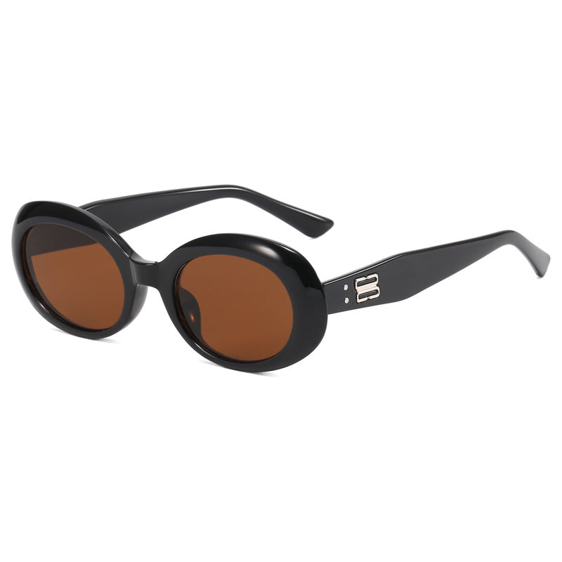 Dame retro-inspirert solbrille med bred ramme Skanto