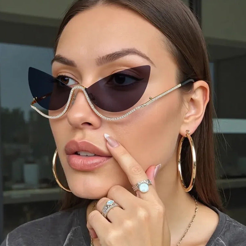 Women's extravagant shaped Cat-Eye sunglasses with sparkling applications Skanto