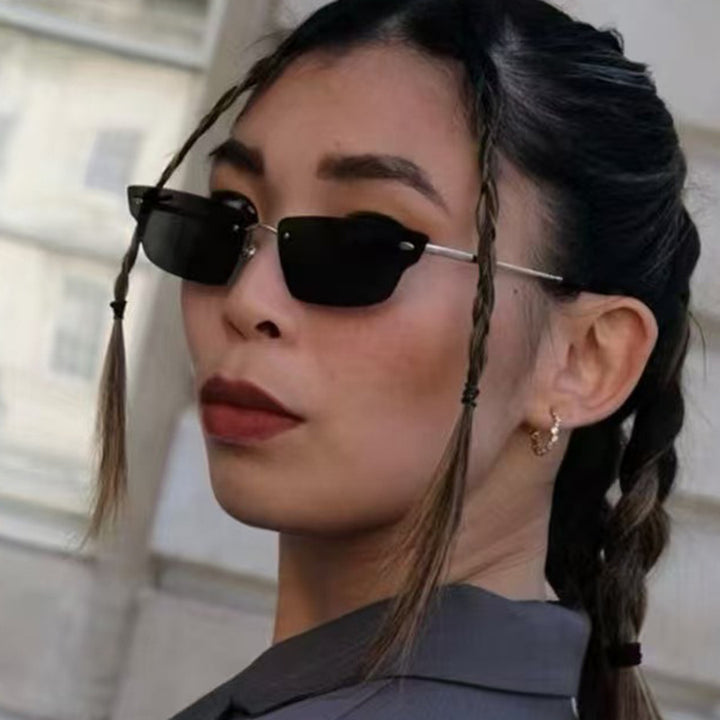 Women's geometric sunglasses with filigree frame and transparent lenses Skanto