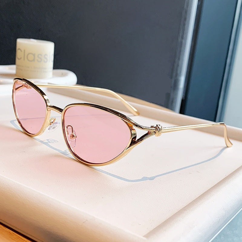 Dame Cat-Eye solbriller med elegant gullramme og polarisert glass Skanto