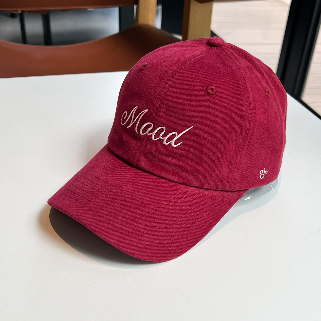 Kvinnenes broderte statement caps Skanto