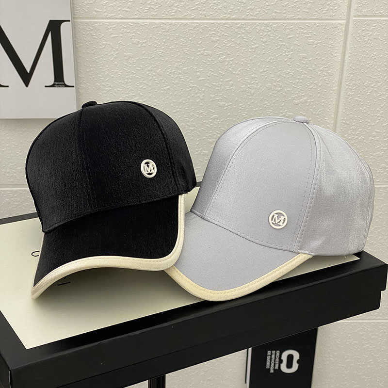 Kvinnenes skinnende sateng baseballcap Skanto