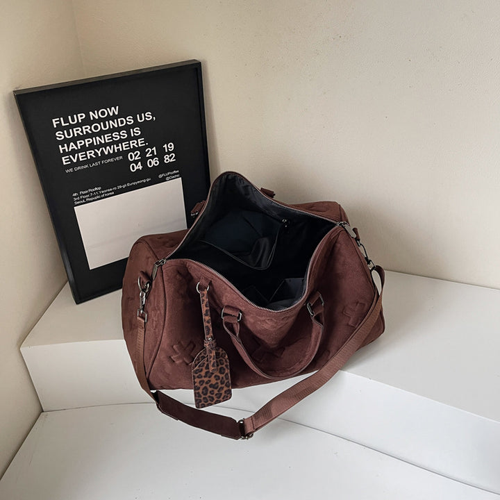 Sporty reiseveske med trendy design og praktiske rom Skanto