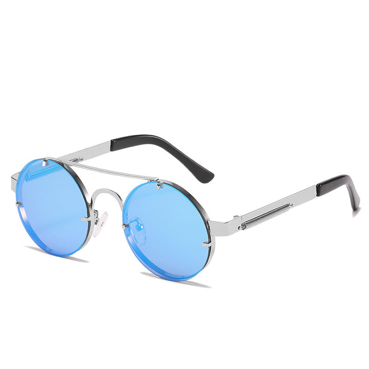 Dame rund designer solbrille med innovativ metallramme og beskyttende linser Skanto