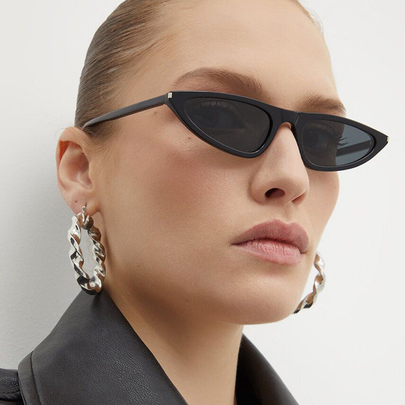 Dame Cat-Eye solbriller med elegant plastikkramme og UV-beskyttelse Skanto