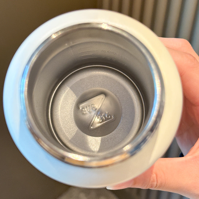 Dame isolert drikkeflaske med dyrevennlig design Skanto