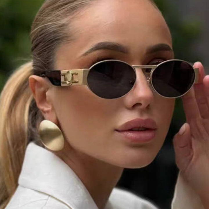 Women's round sunglasses with modern metal frame and UV protection Skanto