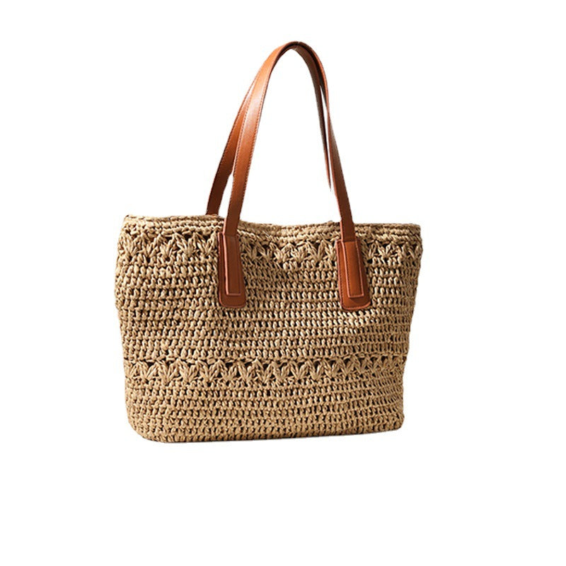 Braided straw basket with sturdy leather handles Skanto