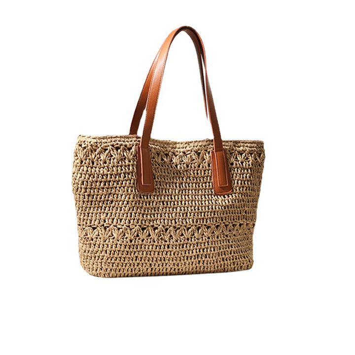 Braided straw basket with sturdy leather handles Skanto