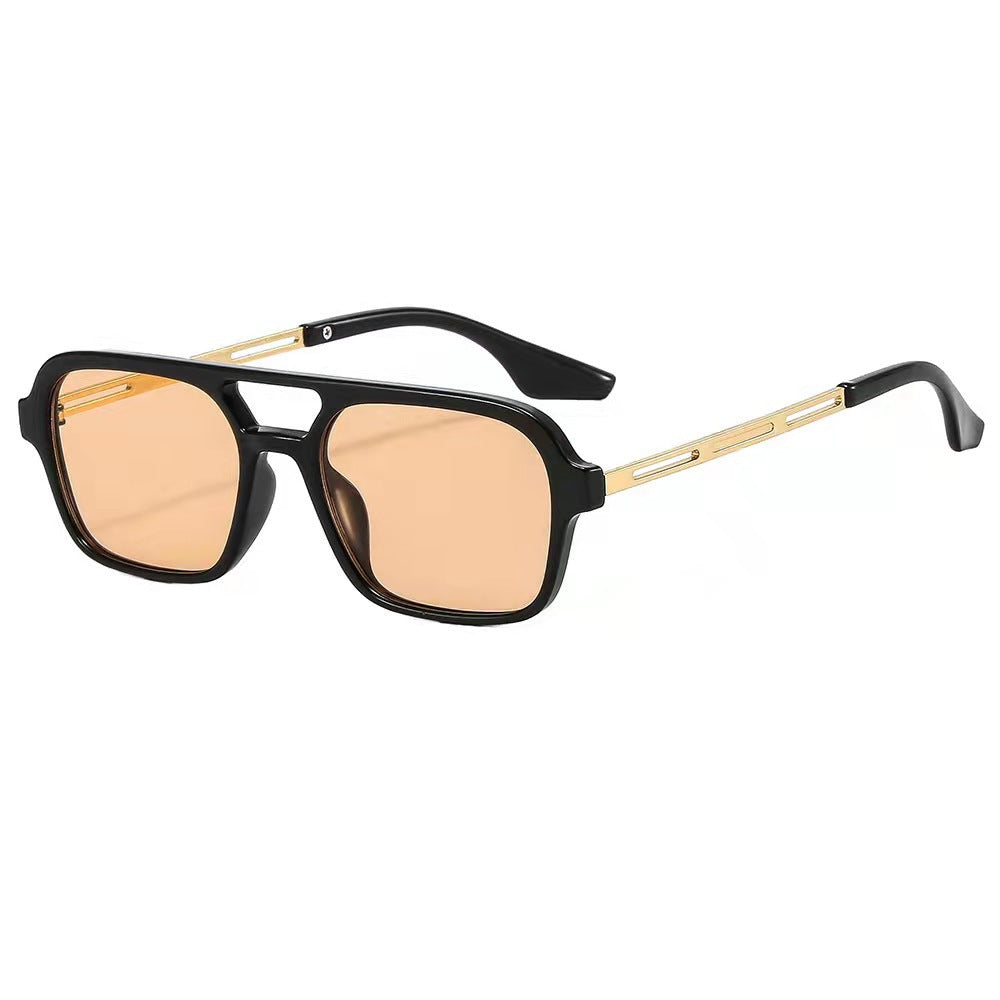 Dame designer solbriller med elegant transparent ramme og gule glass Skanto