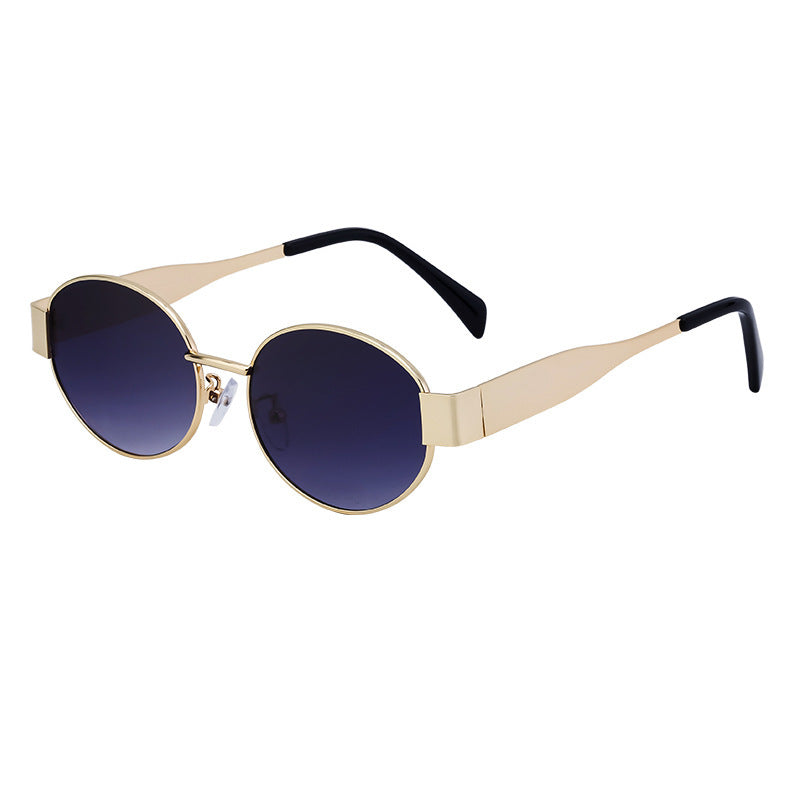 Dame moteriktig solbrille i elegant oval design Skanto