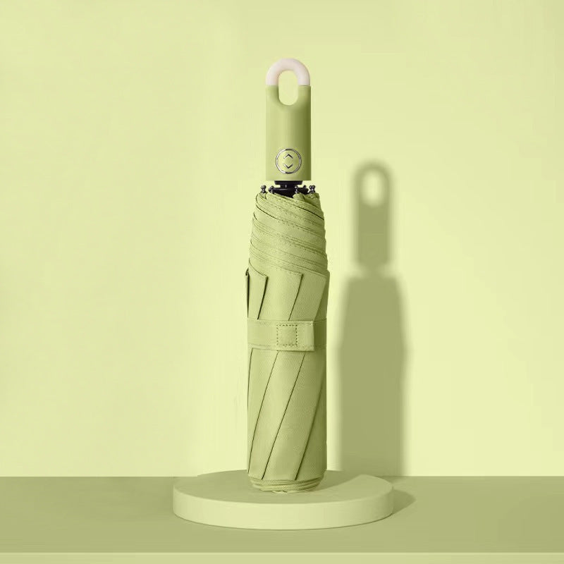 Dame elegant foldes regnparaply med ergonomisk håndtak og UV-beskyttelse Skanto