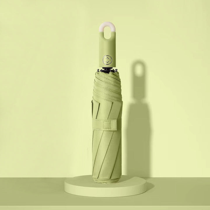 Dame elegant foldes regnparaply med ergonomisk håndtak og UV-beskyttelse Skanto