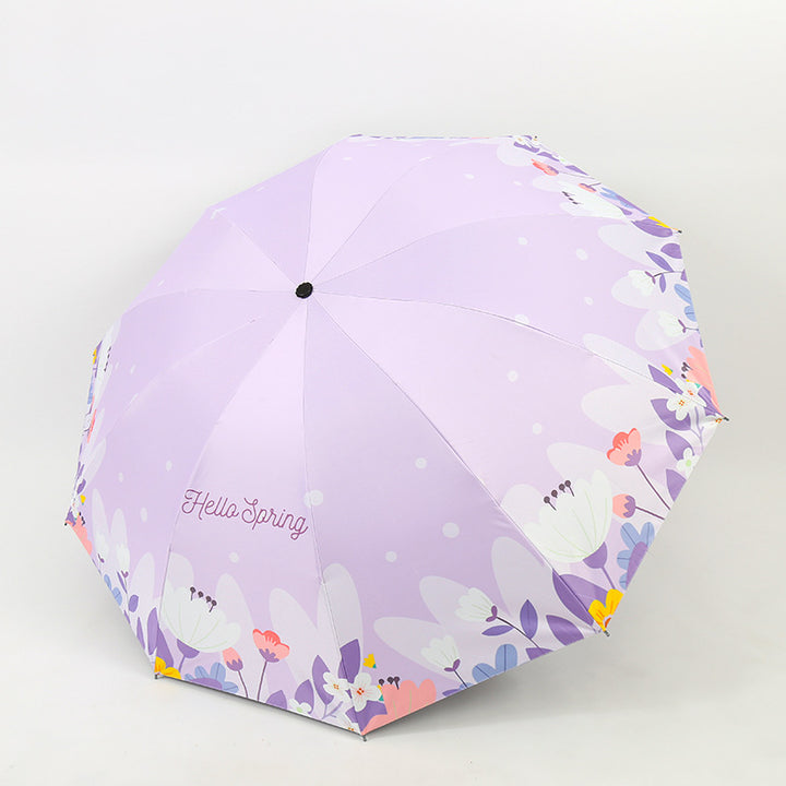 Kvinnes sammenleggbare paraply med blomsterdesign Skanto