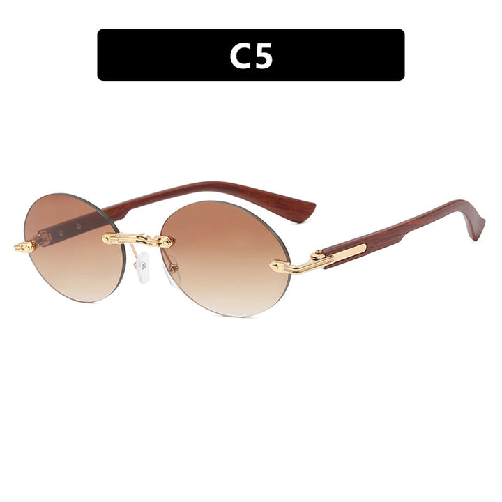 Dame rund solbrille med elegant treinnramme og UV-beskyttelse Skanto
