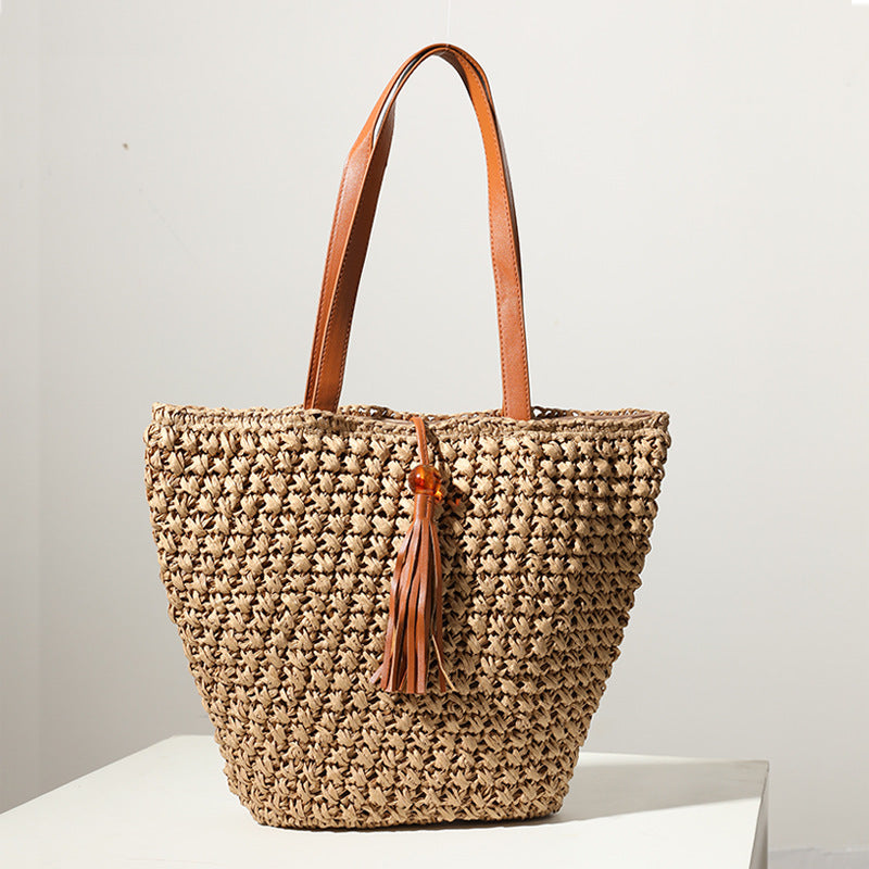 Handmade basket bag with stylish fringe details Skanto