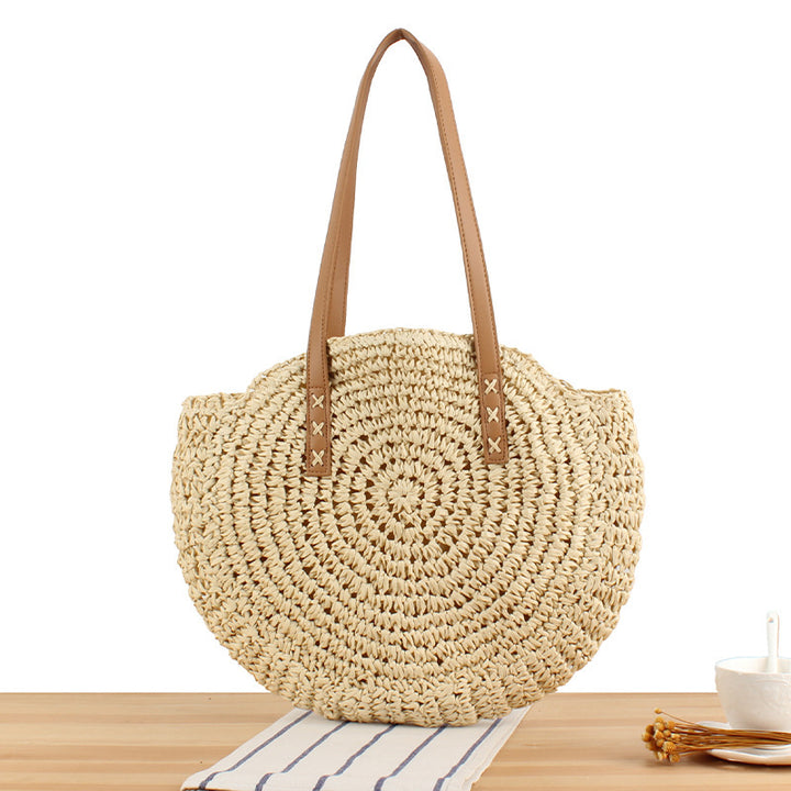 Round straw bag with leather handle Skanto