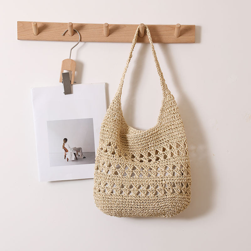 Crocheted shoulder bag with decorative openwork pattern Skanto