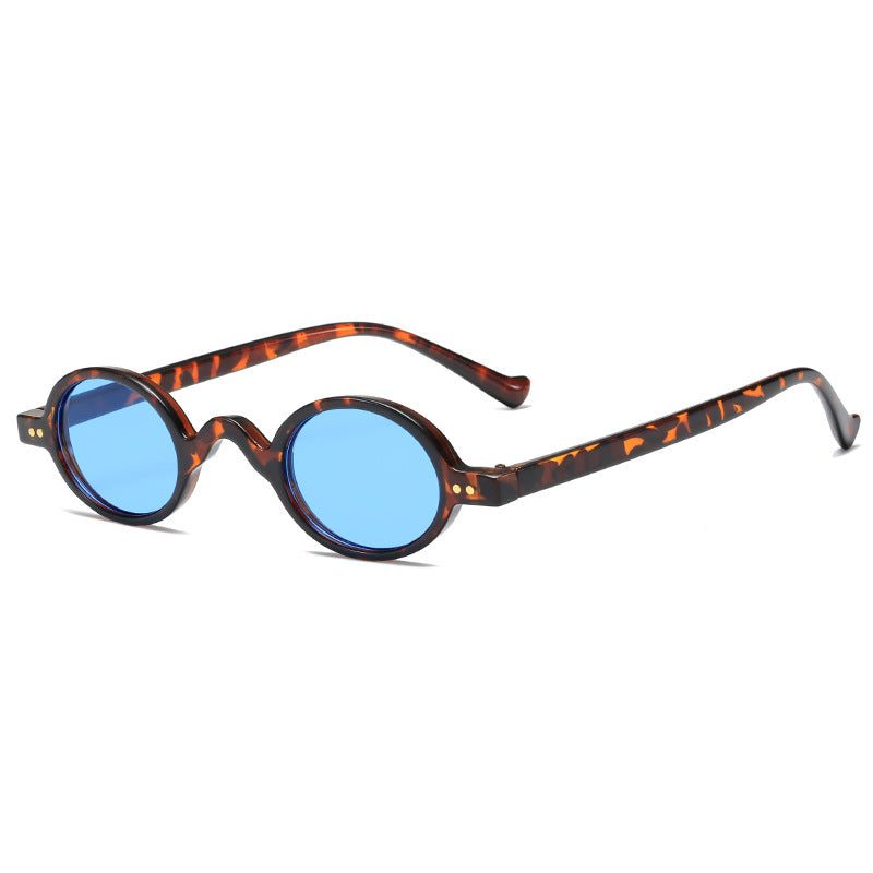 Dame rund solbrille i retrostil Skanto