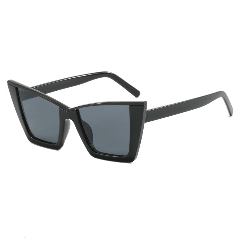 Dame firkantet solbrille med gullige detaljer Skanto