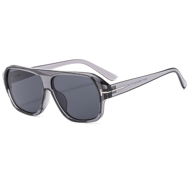 Dame modische solbrille med markant geometri og brune glass Skanto
