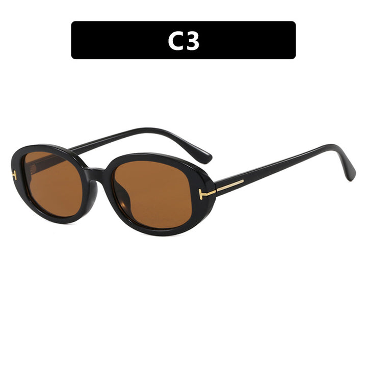 Women's stylish oval sunglasses with golden details Skanto