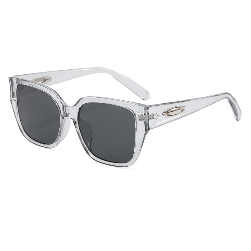 Dame solbrille i moderne kvadratisk design med klare linser Skanto