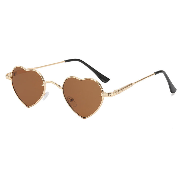 Damer hjerteformet solbrille med filigran metallramme Skanto