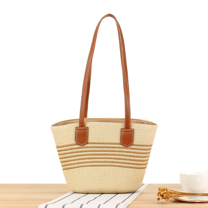 Handbag made of high-quality raffia with elegant leather handles Skanto