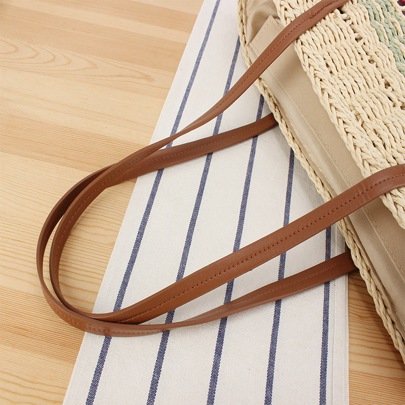 Modern straw bag with leather details Skanto