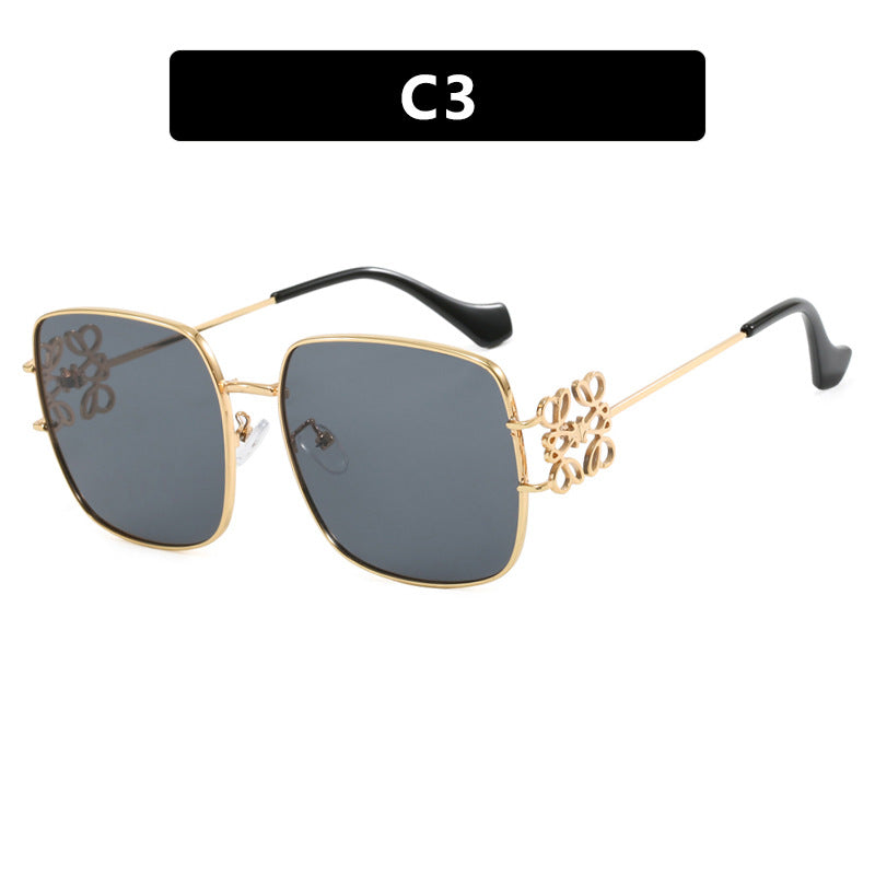 Women's square sunglasses with filigree design and luxurious metal frame Skanto