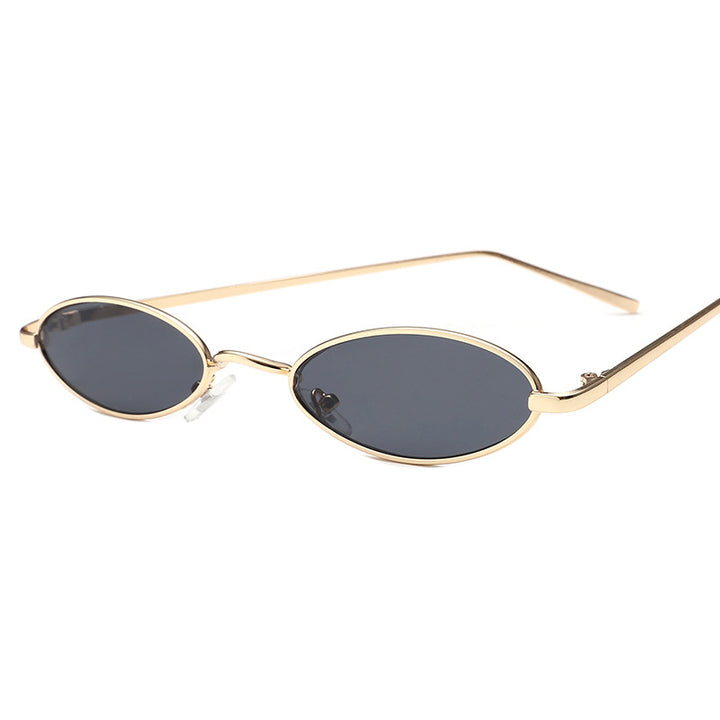 Dame elegant solbrille i oval metallramme Skanto