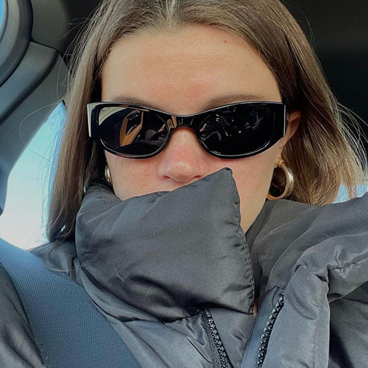 Women's sporty sunglasses with wide frame and UV protection Skanto