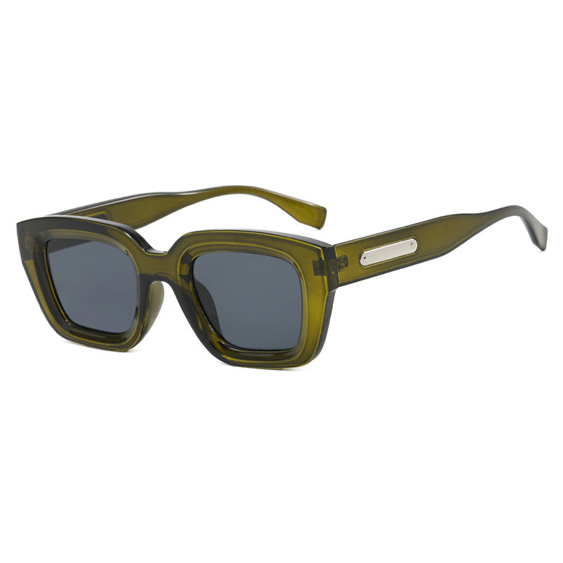 Dame kvadratisk solbrille med gjennomsiktig ramme og brune glass Skanto