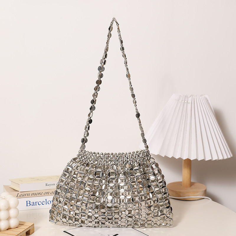 Modern shoulder bag in sparkling design Skanto