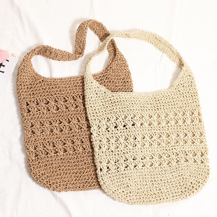 Crocheted shoulder bag with decorative openwork pattern Skanto