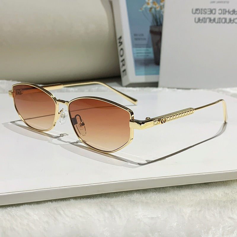 Women's elegant sunglasses with sparkling metal frame Skanto
