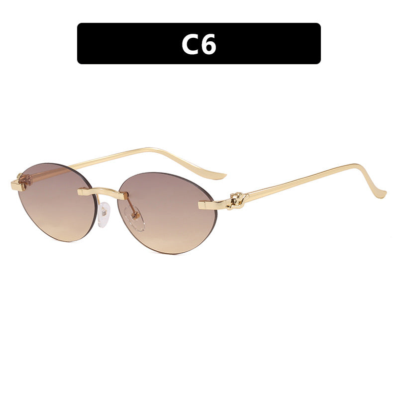 Women's elegant oval sunglasses with gold accent Skanto