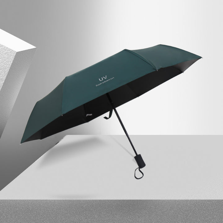 Kvinne Falt Paraply med Elegant Fjærdesign Skanto