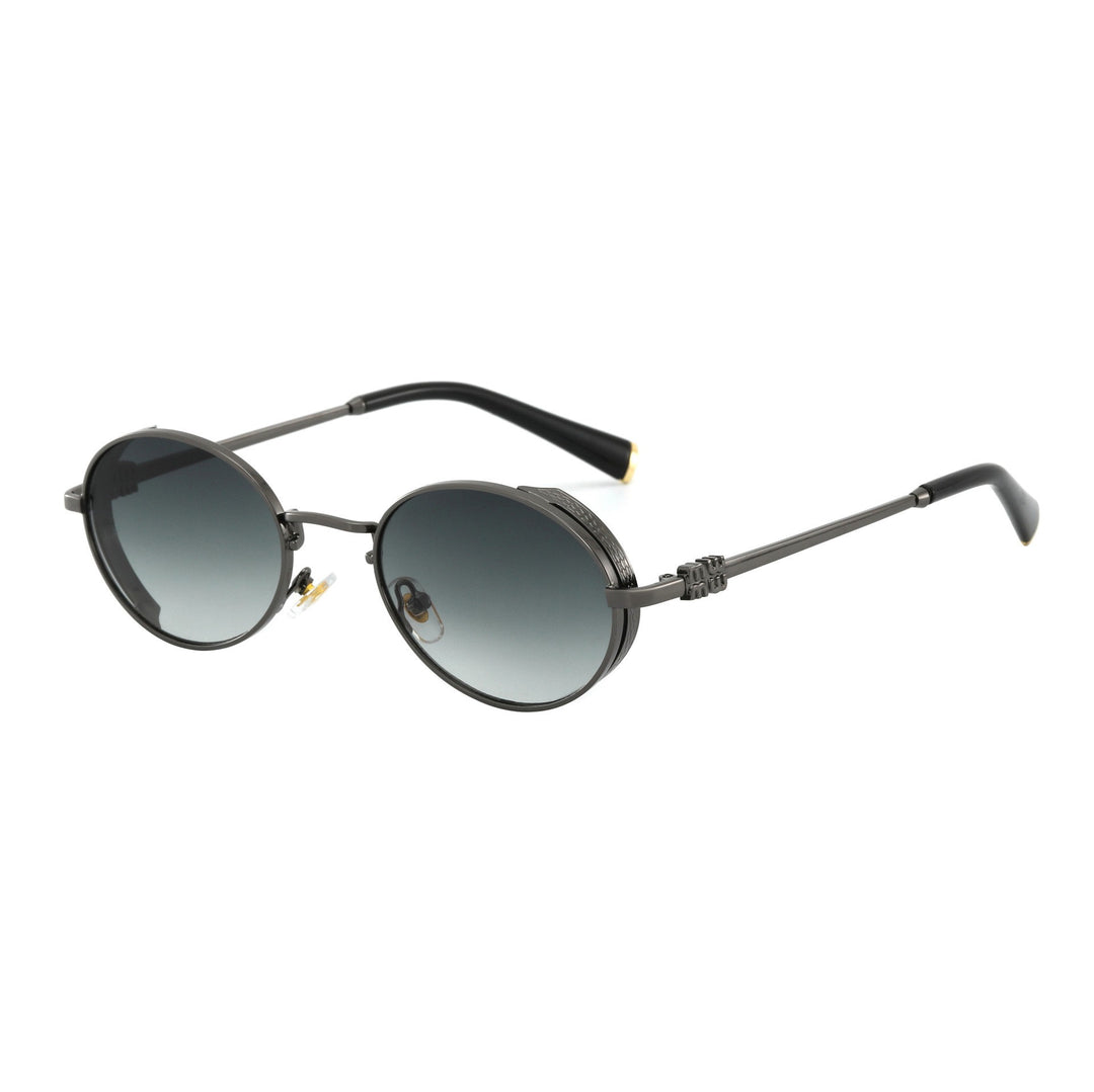Dame Runde Designer-solbrille med elegant metallramme Skanto