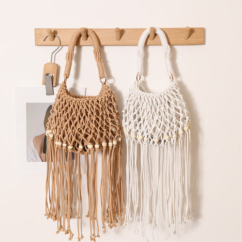 Macrame bag with decorative fringes and wooden beads Skanto