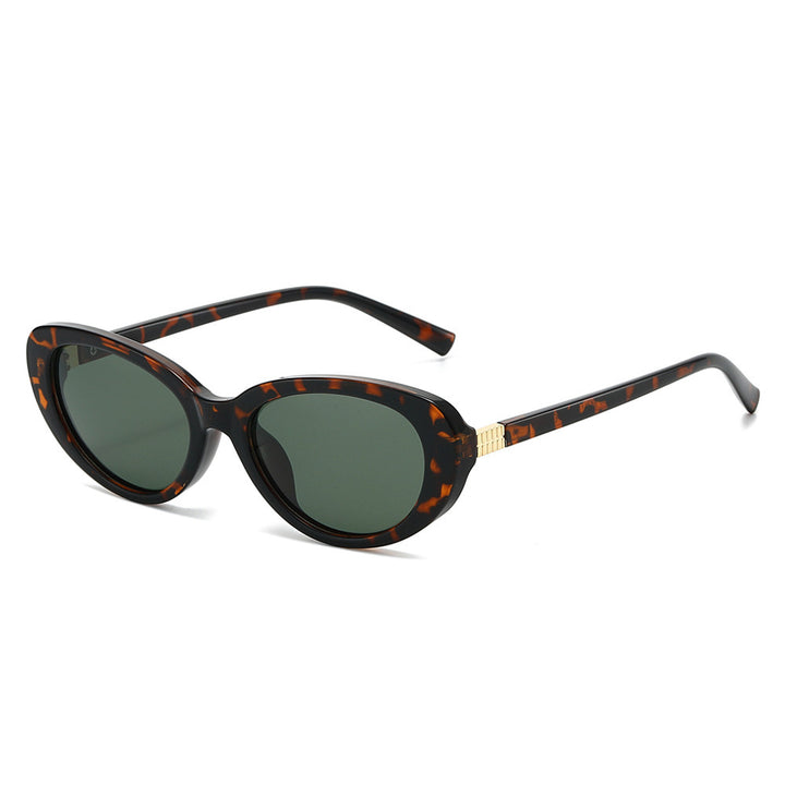 Damer moter solbrille i elegant Cat-Eye-stil Skanto